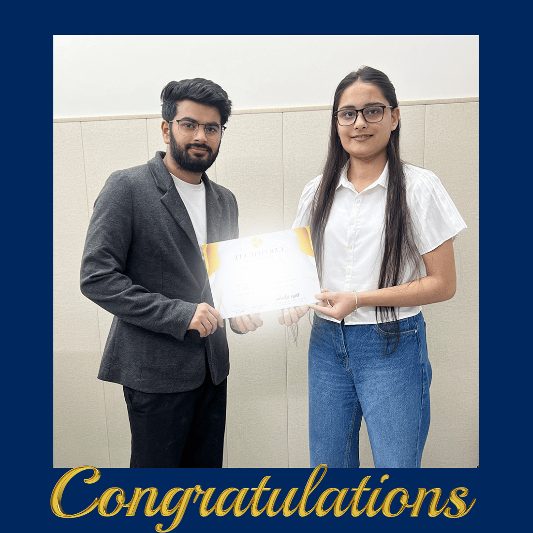 Chetaney Khatter giving certificate to students